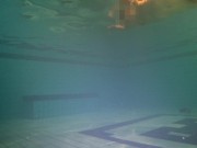 Tight ass finds dildo underwater and swims with it