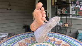 I show off my dirty socks and feet