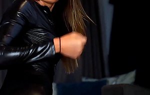 Shiny black catsuit babe masturbating