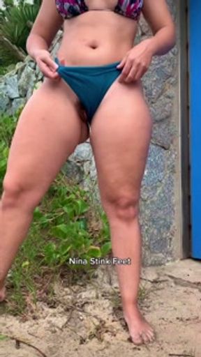 Girl pissing standing on a Public Beach! Public Piss Fetish