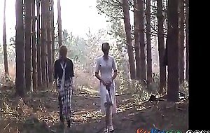 Sara and Jade strip in the woods