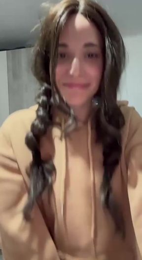 Petite brunette teen plays with her cute solo boobs