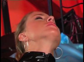 Hot sluts in latex dress and sexy lingerie have a lesbian fuck