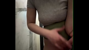 Public masturbation: horny beauty in the FIT gym massages her pussy and squirts on a bench in the locker room