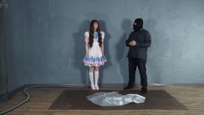 Alice doll in a vacuum bag in the archive with vibro