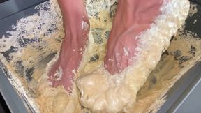 Bare feet in sticky expanding foam