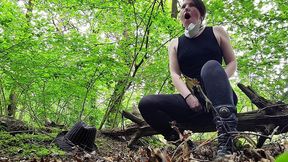 just a very well stuffed corseted slut playing with a vibrator in the woods....