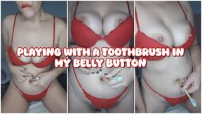 Playing with a toothbrush in my belly button