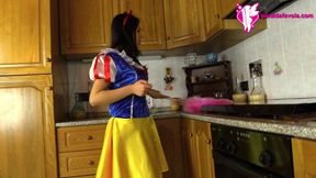 Hot brunette dressed as snow-white massages her feet