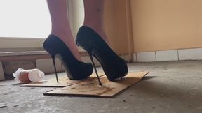 A girl is climbing the stairs home when suddenly her high-heeled shoes stick to something very sticky (reissue)