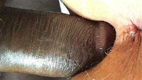 Fat guy's gargantuan dark meat unloads massive creamy load into gaping slit.