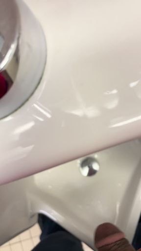 Indian Man Pissing in Public Urinal