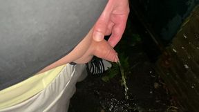 neo pissing outside in the rain