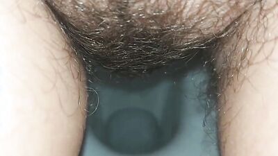 Watch this mature amateur babe pee in her hairy pussy while on her longest trip ever!