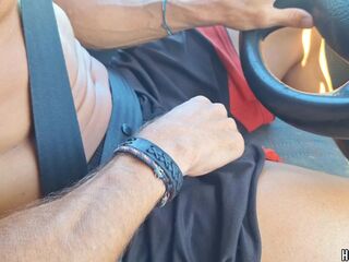 Hawt Dude drives whilst masturbating his large schlong, gets tugjob and footjob from hot passenger