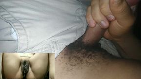 Masturbating