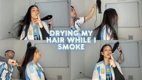 drying my hair while I smoke