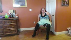 Nurse Vicki  plays with a rubber ball in a mini skirt, sexy stockings and high heel mini boots