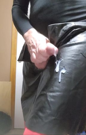 Crossdresser, masturbate and cum black leather skirt red pantyhose.
