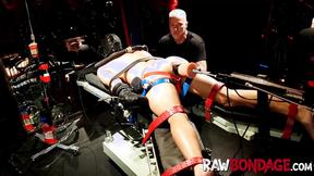 ”Chained jock Devin Franco lying face down being fisted in his butt”