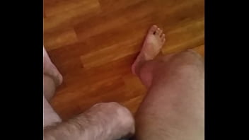 Crossdresser rubs cock in swimsuit