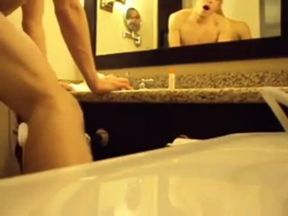 Interracial Couple's Bareback Bathroom Fuck