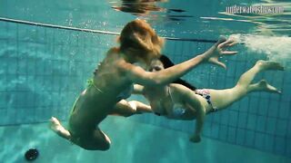 Girls Andrea and Monica Stripping one another Underwater