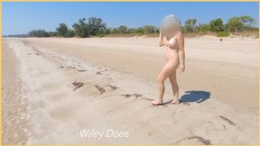 Real MILF wife flaunts big tits on the beach