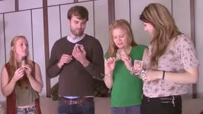 Looser girls are left to entertain themselves after losing a card game