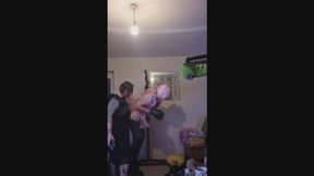 sissy hangs in bondage and spins like a little music box balerina while being electro punished and flogged by mistress pheoinix