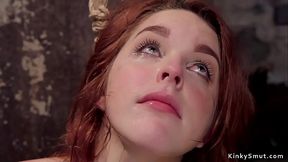 Redhead slave is whipped and fucked