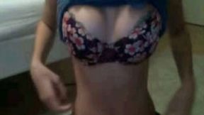 Sexy white chick gets naked on web camera flashing her titties