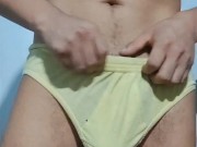 Horny swimmer stroking his huge cock in underwear until he cums