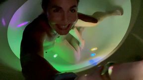 Carissa plays with Glow Sticks in the Bathtub