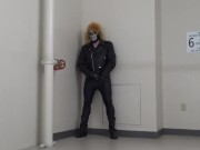 masked leather man quickly shoots his load in hotel stairway