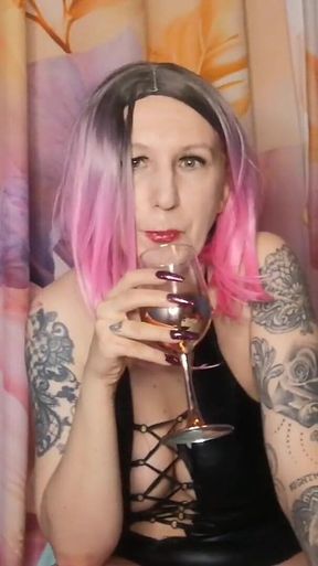 Lady Angela Femdom Goddess Spitting Into a Glas Then Pouring It Out