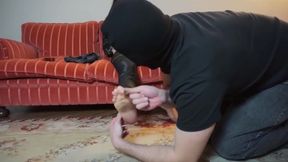 Femdom in leather gets licked on feet from her slave