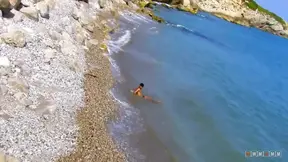 Busty tourist cutie sucks and worships big cock on the beach