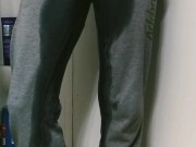 chole fields pees in grey sweats