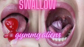 Swallow gummy aliens and cake