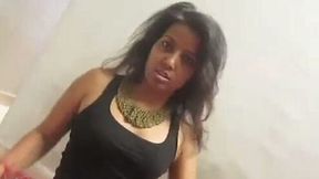 Lewd messy haired brunette flashes her body while stripping and dancing