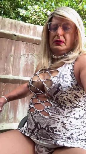 Sexy Crossdresser kellycd2022 in white animal print dress pantyhose and heels