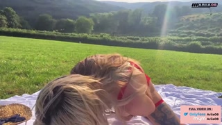 Petite french alt girl with big tattooed in a meadow in the countryside