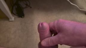 My Friend Sits in a Chair and Jerks off His Cock While Watching Video