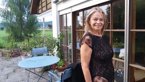 A Mature Woman Shows off Her Figure Outside in a Lace Bodysuit!