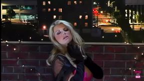 Blonde babe gets DP by two guys on a rooftop