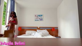 Woman Being Recorded in Hotel Room