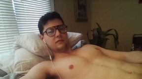 Cute Twink in Glasses on Bed with Old Sheets