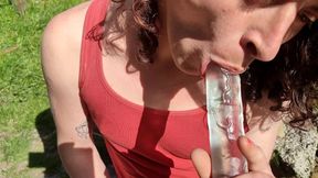 Outdoors dildo sucking