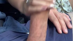 Chinese babe jerks off big white cock while driving